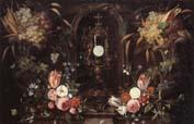 Jan Van Kessel Still life of various flowers and grapes encircling a reliqu ary containing the host,set within a stone niche